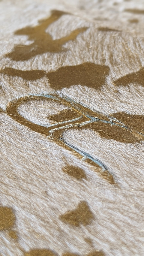 Kuhfell gold