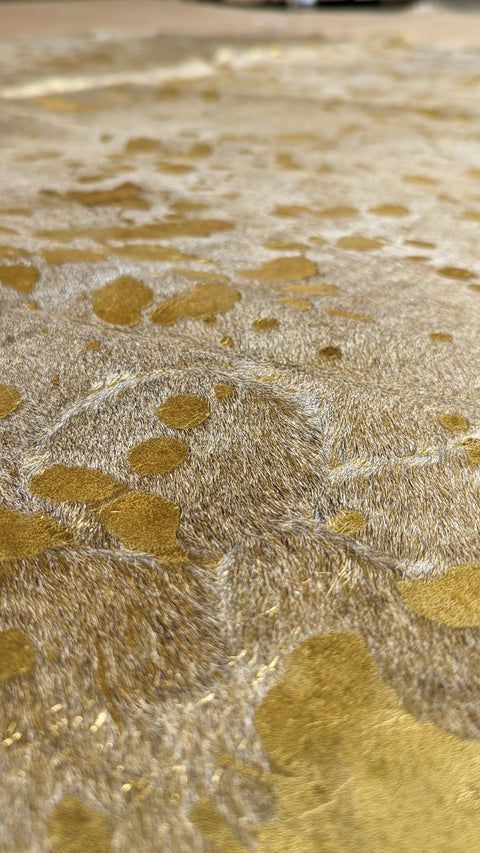 Kuhfell gold